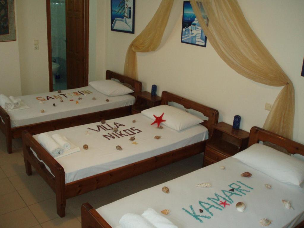 Villa Nikos Karamolegkos Kamari Bilik gambar